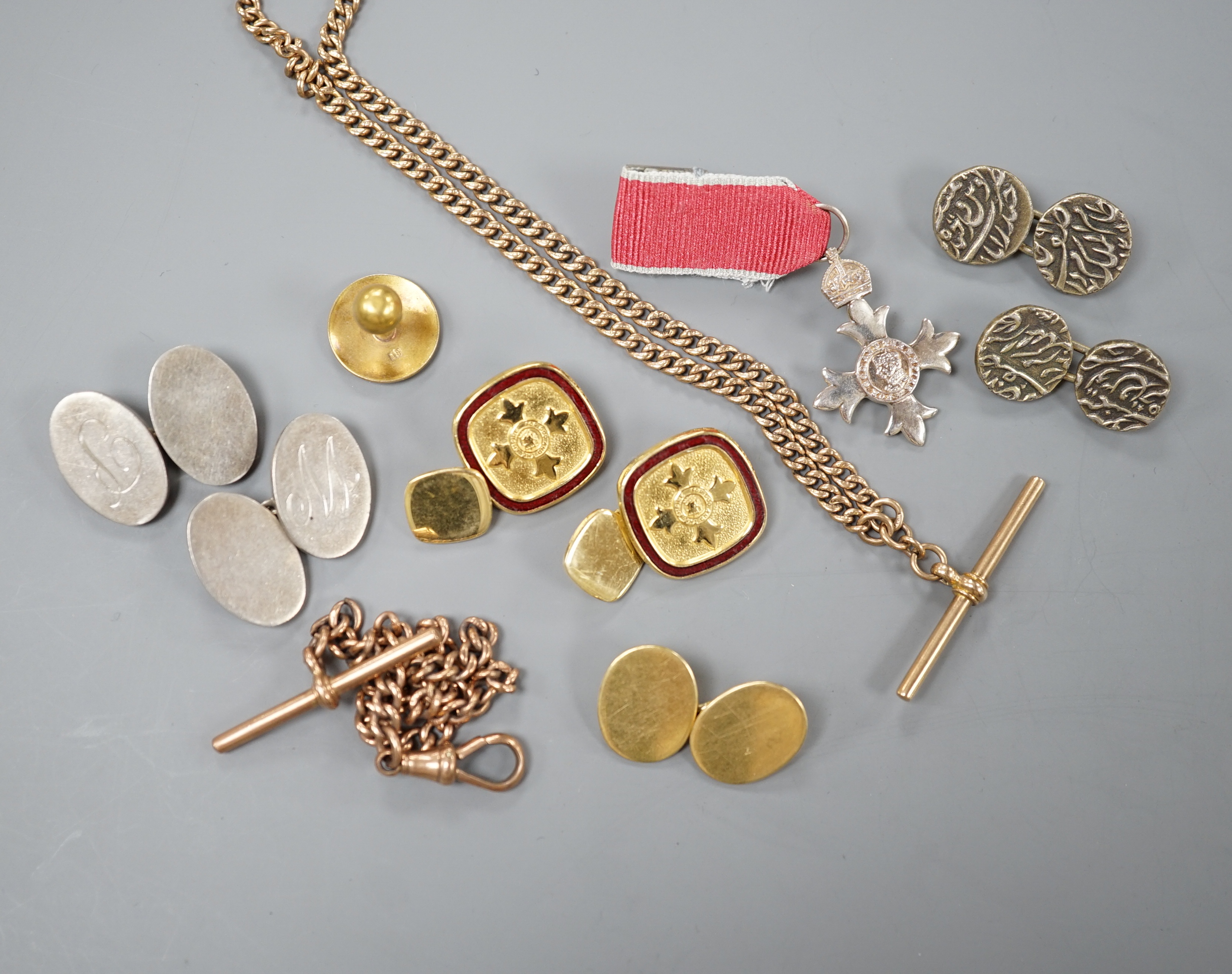 A modern pair of silver gilt and enamel cufflinks, an Edwardian 9ct gold albert, 41cm, 17.9 grams, a smaller 9ct gold albert, 19.5cm, 10.6 grams, an 18ct gold cufflink and dress stud stamped 18, gross 8.4 grams, two othe